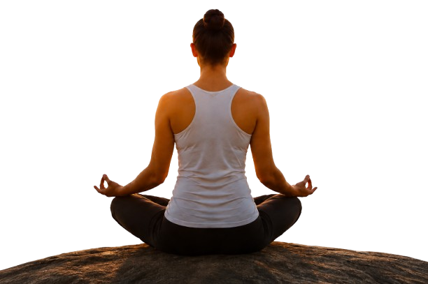 Woman meditating in lotus pose at sunrise